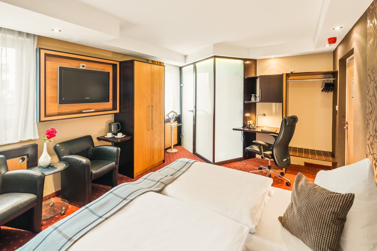 L'Escala Hotel Dreieich Bagian luar foto