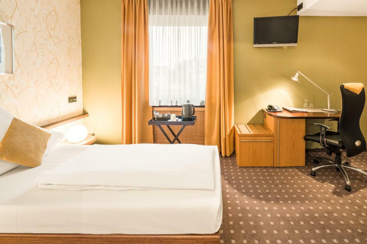 L'Escala Hotel Dreieich Bagian luar foto
